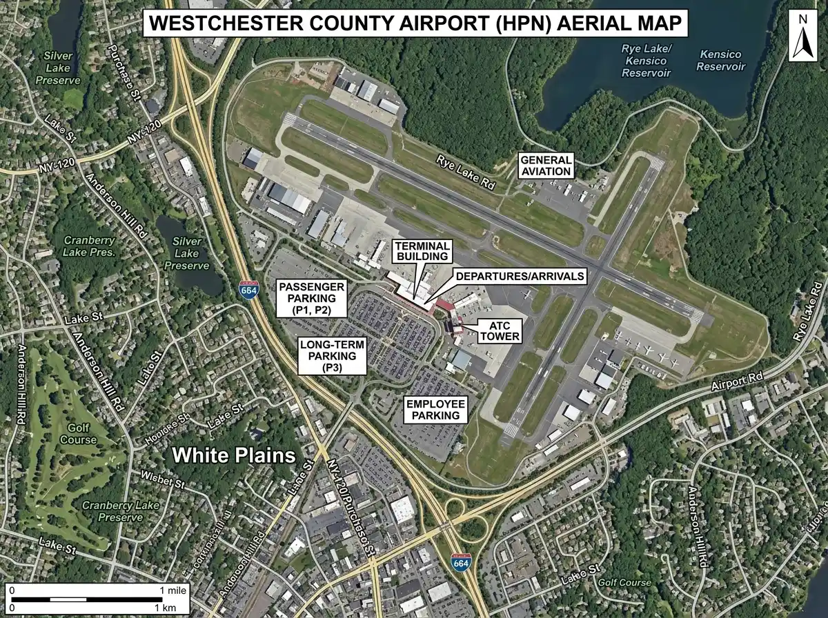 Aerial map view of Westchester County Airport HPN with terminal building, parking lots marked, surrounding White Plains suburban area